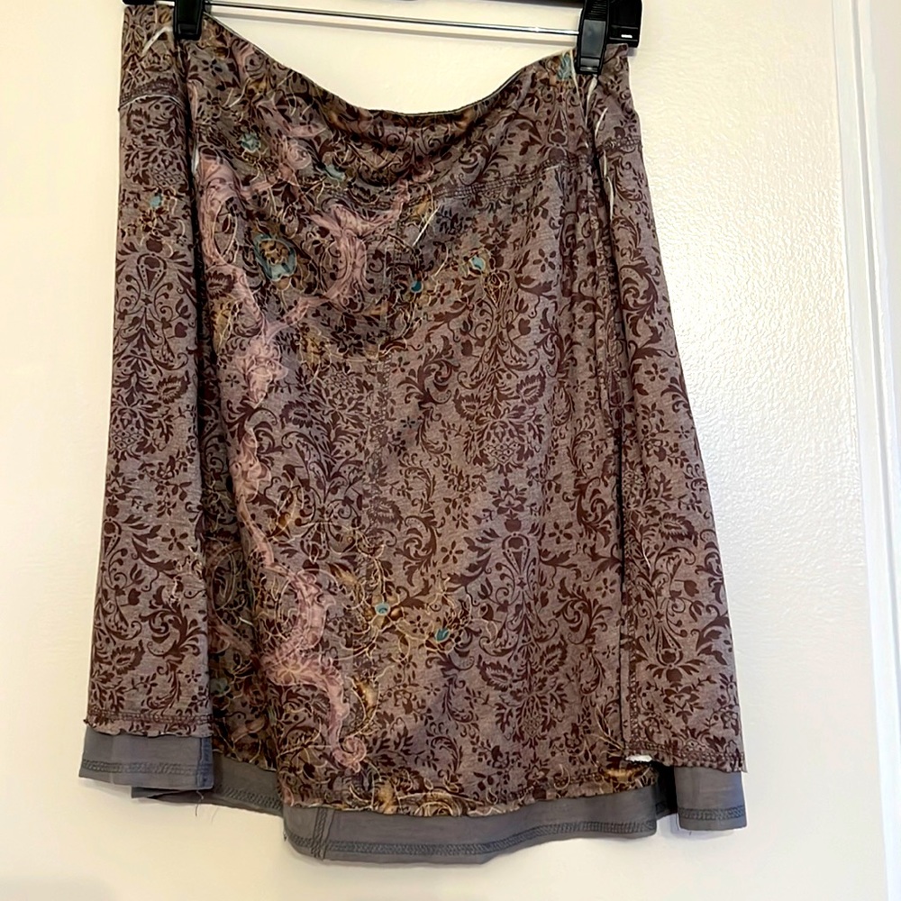 Petite A- line skirt. Rough hem lining shows. Slightly distressed design. PL